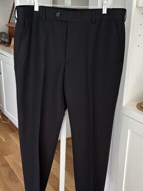 Men’s Izod dress slacks size 36 x 30. Black with subtle  grey stripe